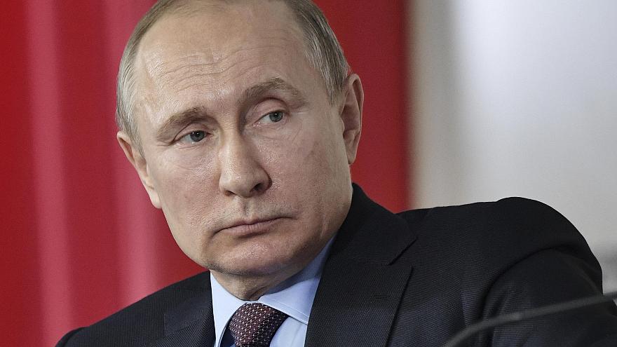 Putin warns against foreign intervention